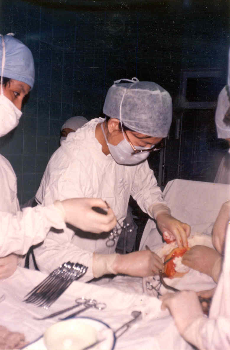 Dr. Ma porforming surgery when she was in China.